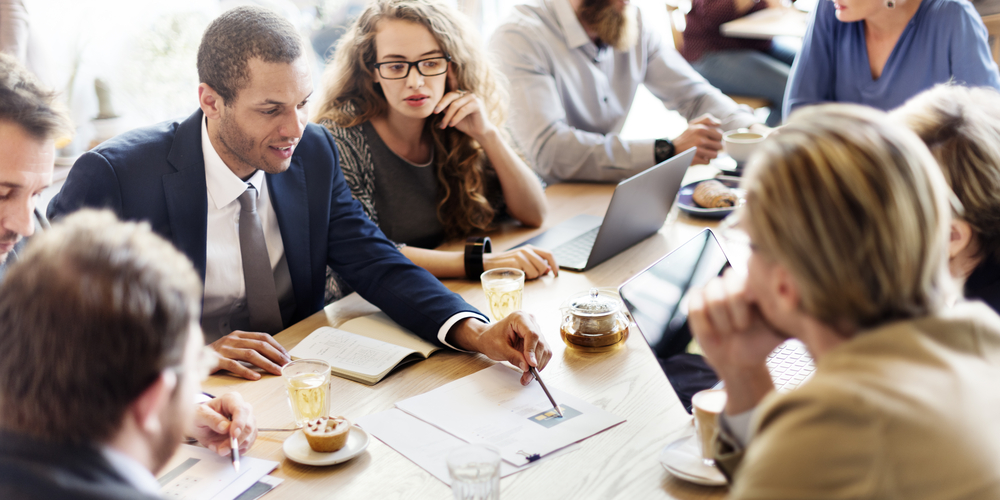 HR team around a table discussing post-brexit challenges