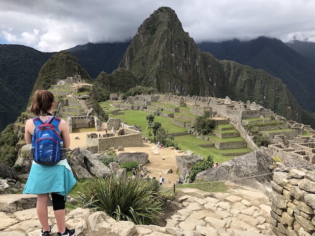Mira's daughter stands overlooking Macchu Picchu in Peru in 2018.