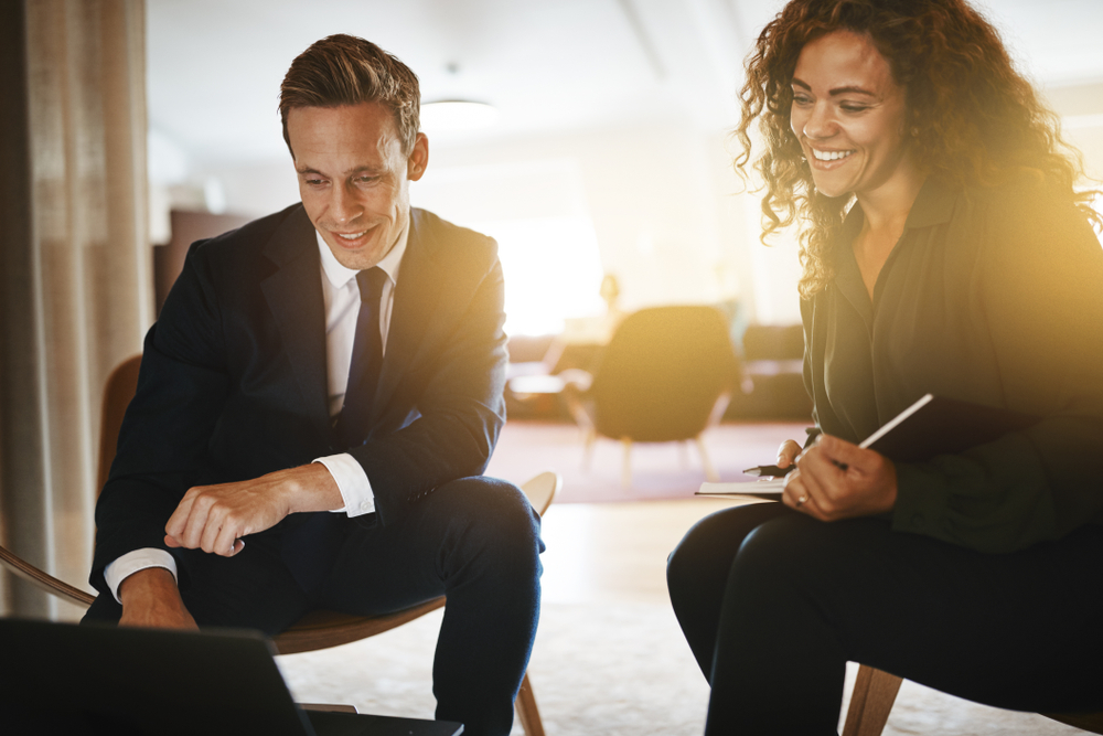 Female and male colleague in a mentoring session