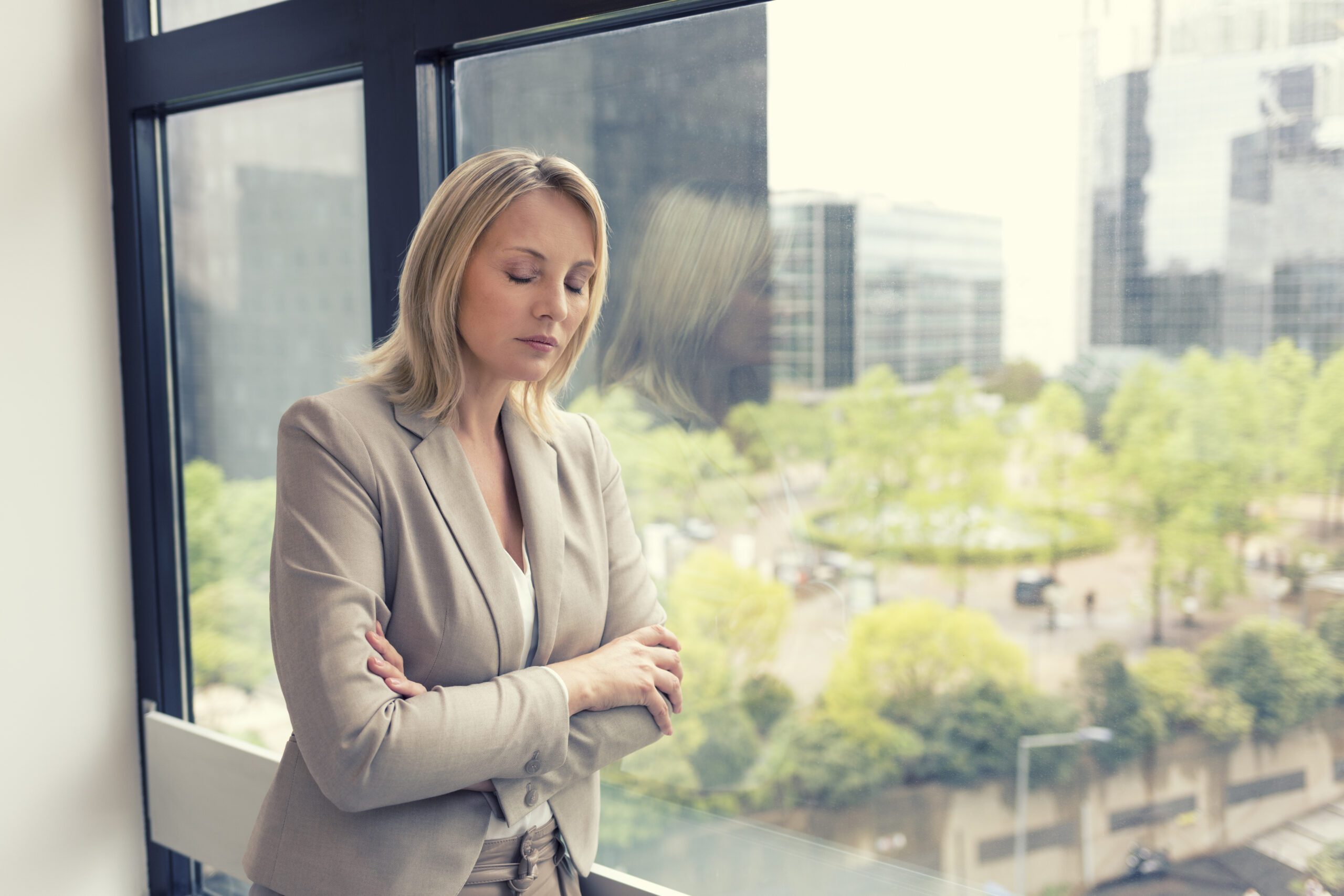 Woman experiencing high levels of stress at work