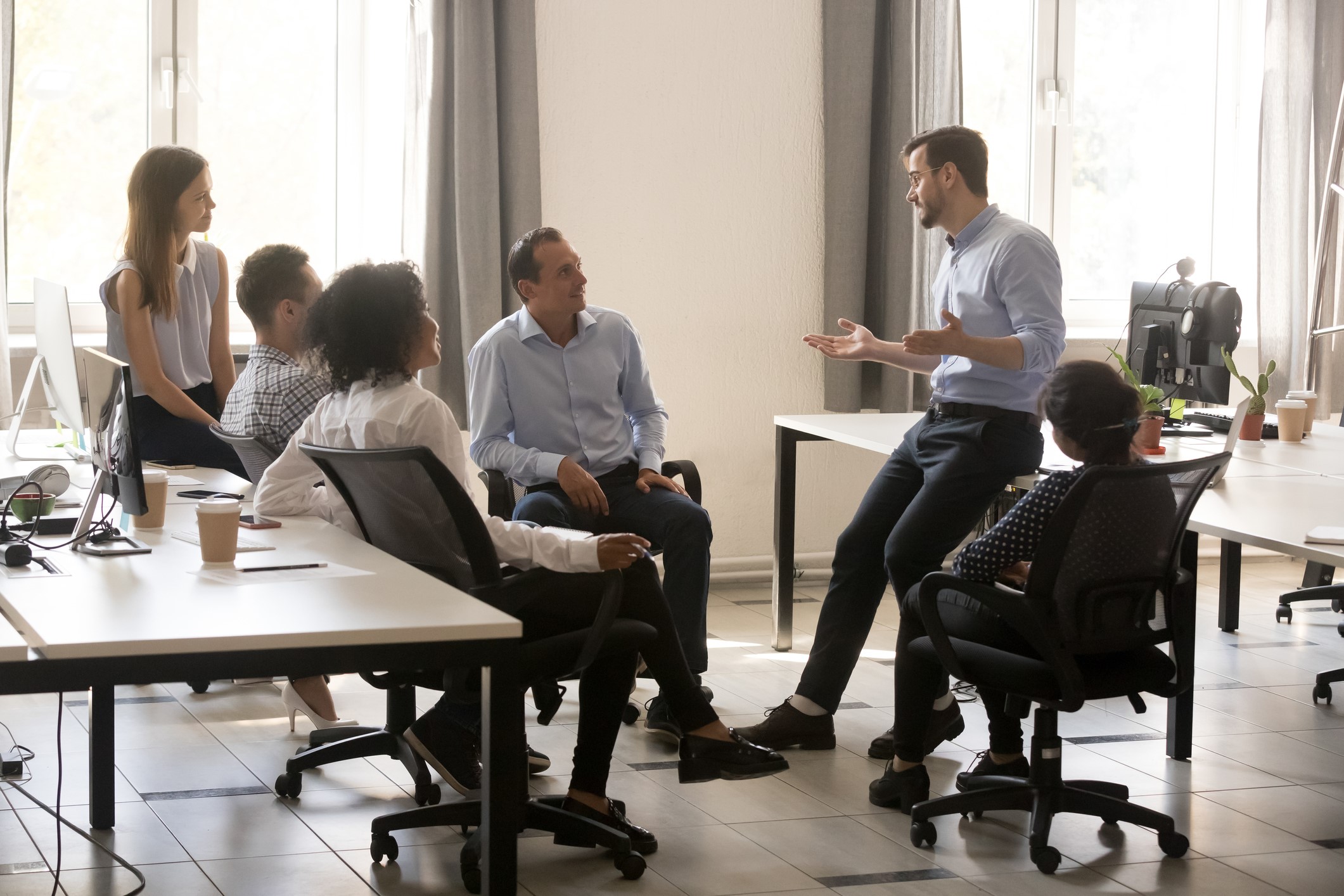 Business people having an informal meeting in the office