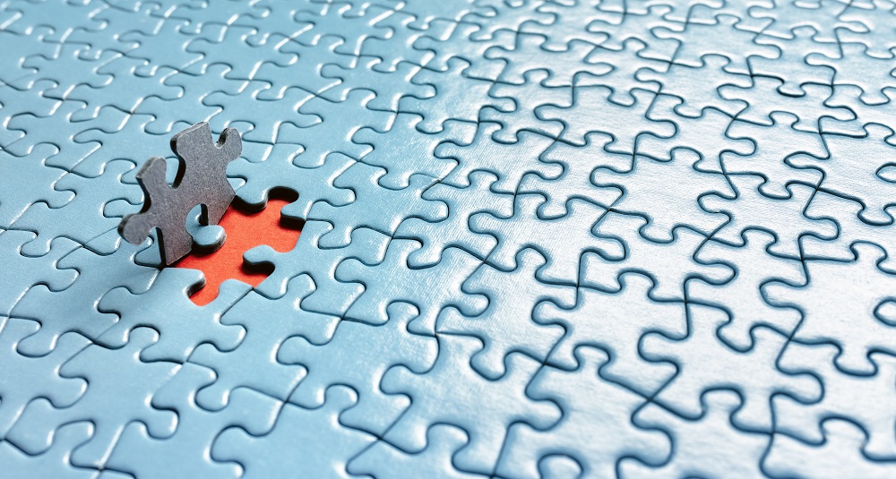 The last piece of jigsaw puzzle concept for solution and completion HR leader supporting employees through workforce change