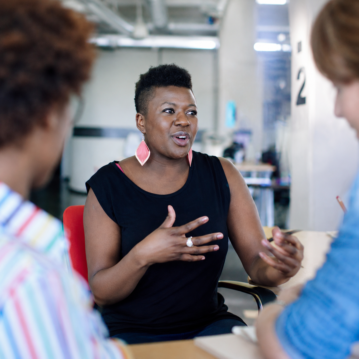 Engaged conversation in a modern office