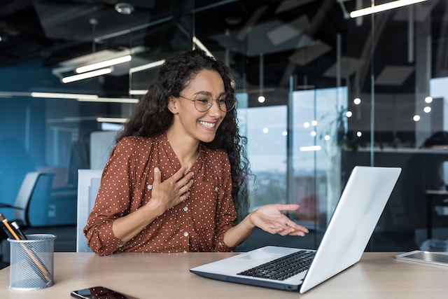 Young Hispanic female job seeker has virtual meeting with a career coach