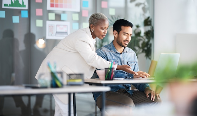 Black female manager mentors a male employee