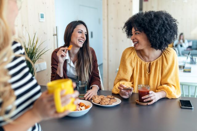 employees sharing homemade treats at work for the holidays