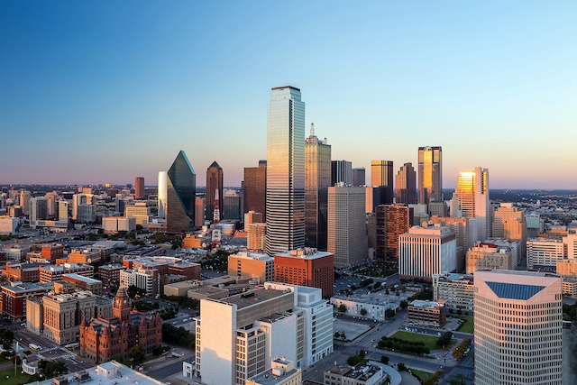 Dallas outplacement services are available through INTOO, as represented by the city skyline